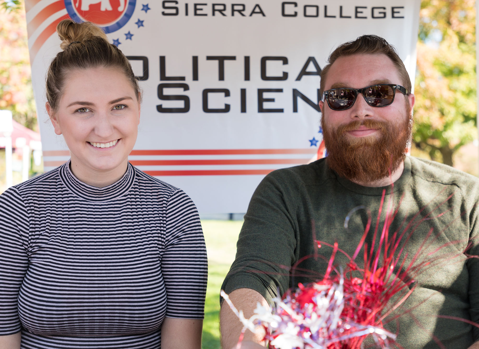 Students at the Political Science booth during Wolverine Week
